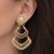 Klipsy do uszu złote z kremowym ozdobnym kamieniem wieczorowe