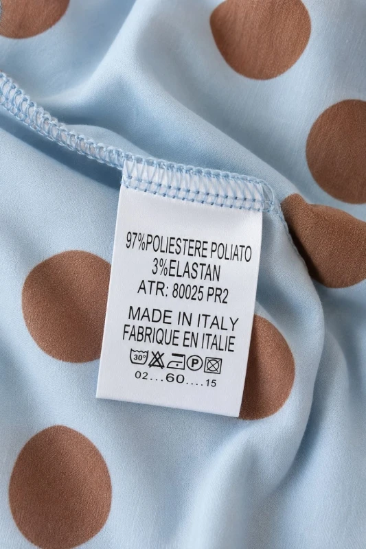 Bluzka damska kopertowa w grochy niebieska wiązana elegancka Italy