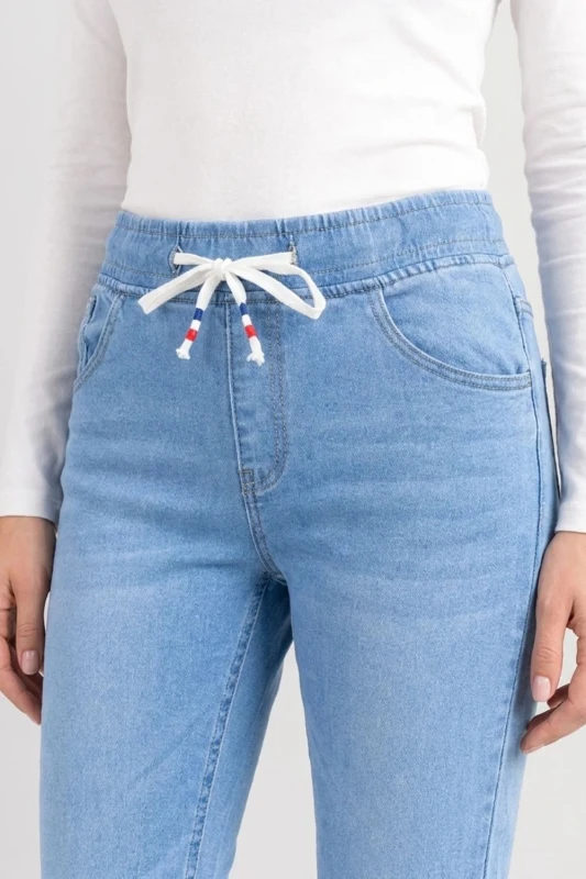 Spodnie damskie jeansowe z wiązaniem jasny denim M