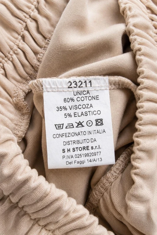Spodnie damskie beżowe z obniżonym krokiem luźny krój Made in Italy